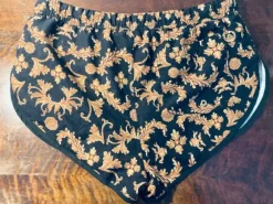 ASOS baroque pattern gold and black swim shorts