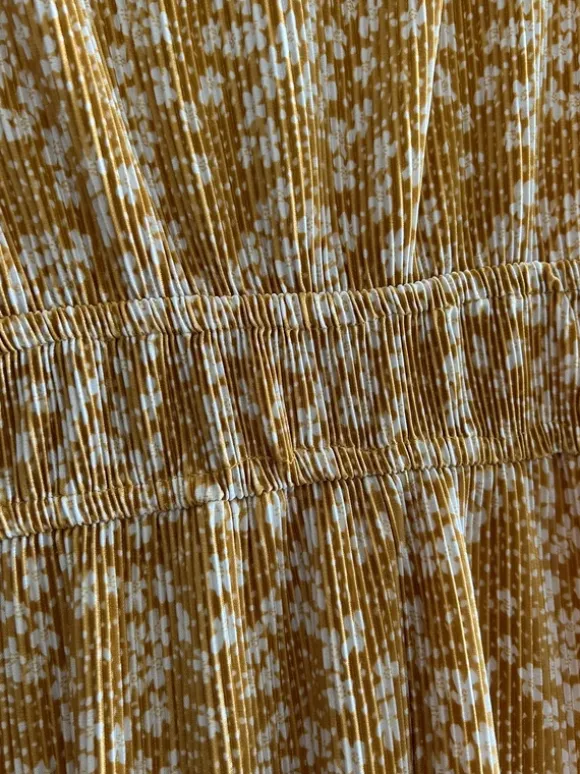 Blommig byxdress