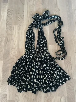 Blommig playsuit