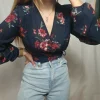 Bluzka kopertowa Gina Tricot kwiaty granatowa elegancka r. 40 L floral