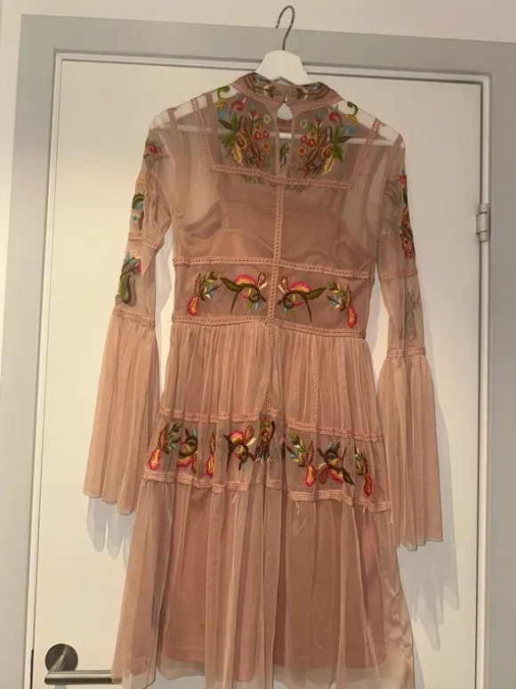 Frock and frill storlek 10