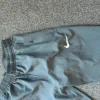 Grå Nike miler bukser