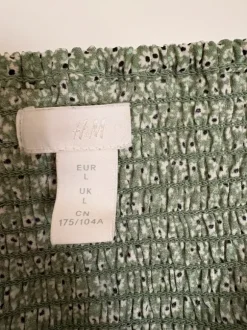 Grön blus med rynk