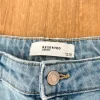 Jeansy falre Reserved