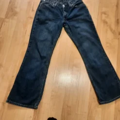 Jeansy Levis Strauss&Co 529 W29L30 zasuwane na suwak