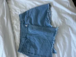 Light blue denim mini skirt