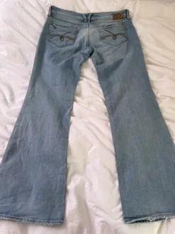 low rise ripped bootcut jeans 00s
