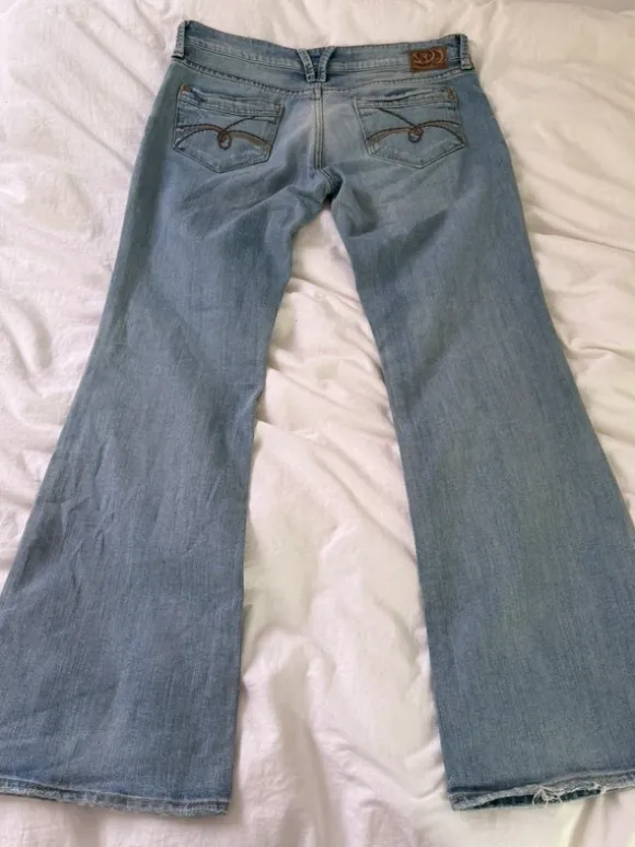 low rise ripped bootcut jeans 00s