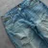 Niebieskie jeansy z dziurami distressed olderbrothercore