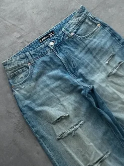 Niebieskie jeansy z dziurami distressed olderbrothercore