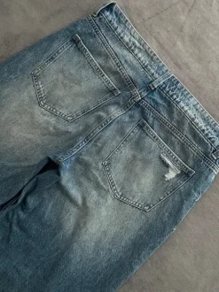Niebieskie jeansy z dziurami distressed olderbrothercore
