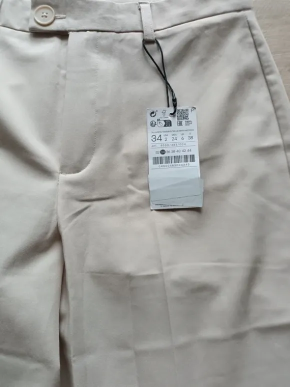 Nowe spodnie Stradivarius z metką rozmiar 34 xs kolor beżowy