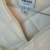 Quiltet vest med bindebånd