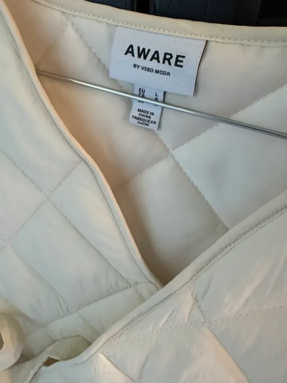 Quiltet vest med bindebånd