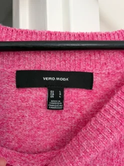Rosa stickad tröja