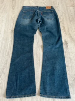 Spodnie dżinsowe dżinsy dzwony levis 515 bootcut flared jeans washed denim vintage y2k sk8