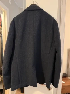 Uniqlo mörkblå ullkavaj, storlek M