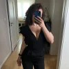 WalG kombinezon czarny z falbaną XS